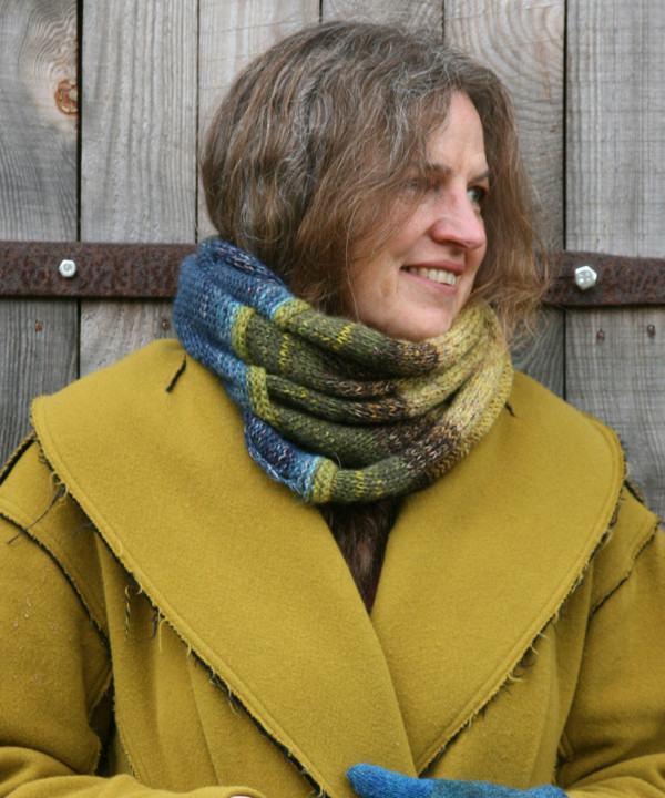 Summer storm color way snood cowl worn by Inese Iris Liepina the knitter and designer for Wrapture by Inese.