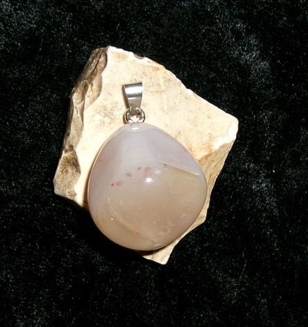 Pendant with WERE-OWL