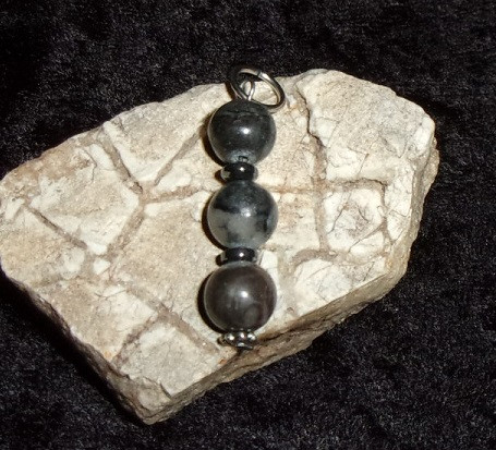 Pendant with WERE-RAVEN