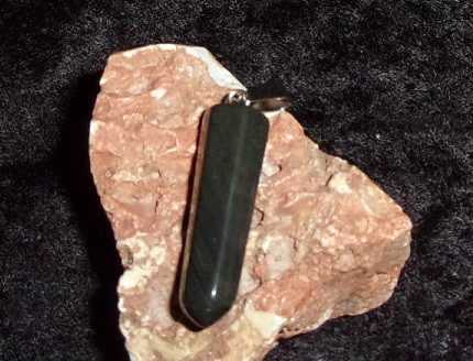 Pendant with WERE-DRAGON