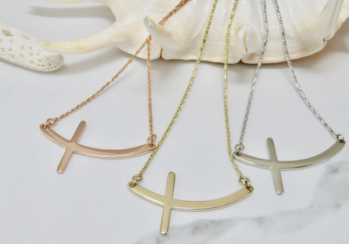 14KT Sideways Curved Cross Necklace  |  Price Varies Based on Length