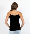 Black merino wool thermal singlet with thin adjustable straps, back view showing smooth finish