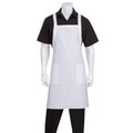 White crossover back bib apron with two front patch pockets, worn over black shirt and trousers