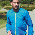Sapphire blue lightweight running jacket with fluorescent yellow contrast zipper and hood drawstrings