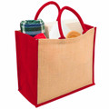 Natural jute tote with red trim and gusset panels, wide body with contrasting red handles