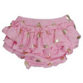 Pink satin baby bloomers with metallic gold polka dots and ruffled chiffon tiers across the back