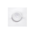 White chef jacket button with textured fabric and central buttonhole detail