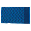 Azure blue gym towel with zigzag pattern and solid navy blue end panel featuring pocket detail