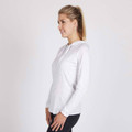 White long sleeve hooded t-shirt with drawstring hood and fitted silhouette shown on model in side profile