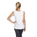 Woman wearing white sleeveless muscle tee tank, rear view, dropped armholes, smooth back panel, paired with charcoal pants