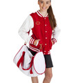 Young girl holding white and red mini canvas sports bag with circular side pocket and gold clip hardware