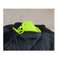Close-up of black quilted flying jacket with packable fluorescent yellow hood stored in ribbed collar