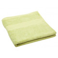 Soft lime green bamboo cotton bath towel folded with decorative border stripe visible