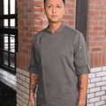 Charcoal grey chef jacket with mandarin collar, side zip closure, and three-quarter length sleeves with roll-tab detail