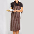 Brown and white vertical striped full bib apron with adjustable neck strap and front pocket