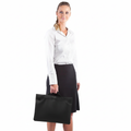 Woman holding black Excel Plain Polyester Zipped Satchel, front view, for blankclothing.com.au