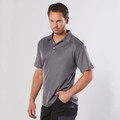 Man wearing charcoal grey short sleeve polo with contrast shoulder stitching panels and three-button placket