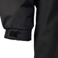 Black longline jacket with ribbed cuff featuring hook and loop closure detail