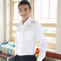 White long sleeve school shirt with chest pocket and button-down collar worn by smiling person