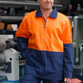 Hi-vis safety jacket with orange upper panel, navy lower section, navy collar, and full-length front zipper