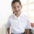 Girl wearing white short sleeve school shirt with point collar, button front and chest pocket