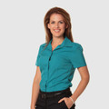 Teal short sleeve collared shirt with button-front closure and chest pocket