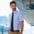 Sky blue and white gingham check short sleeve shirt with button-down collar worn with navy tie