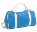 Azure blue canvas duffle bag with contrasting white handles and side stripes, removable shoulder strap