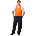 High visibility orange action back vest worn with navy work trousers featuring cargo pockets