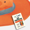 Hi-vis orange safety hat with grey reflective trim and contrast stitching detail