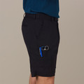 Black stretch cargo shorts with side cargo pocket and blue zipper detail, paired with teal polo shirt