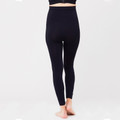 Black high-waisted maternity support leggings with seamless construction and full-length coverage