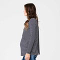 Pregnant model in side profile wearing navy and white stripe long-sleeve swing top with relaxed fit