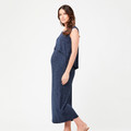 Pregnant model wearing a navy marl sleeveless maxi dress with layered swing back panel, side profile view