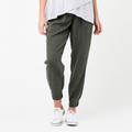 Olive Tencel jogger-style maternity pant with patch pockets and elasticated cuffs, worn with white sneakers