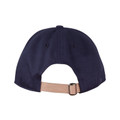 Navy cap with tan underpeak and adjustable rear strap featuring metal buckle closure