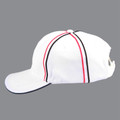 White structured cap with navy and hot pink contrast piping detail and matching curved brim trim