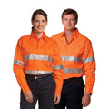 Orange high visibility work shirt with silver 3M reflective tape across chest and sleeves, paired with navy work pants