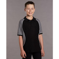 Boy wearing black pique polo with charcoal raglan panels and white contrast piping trim