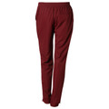 Maroon track pants with elasticated waistband, side pockets and ankle cuffs shown from rear three-quarter view