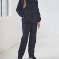 Child wearing navy polyester track pants with matching navy and gold zip jacket, straight leg fit