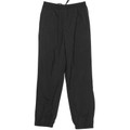 Black polyester track pants with elasticated waistband and cuffed ankles in flat lay view