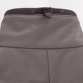 Charcoal grey softshell jacket showing back waistband with black zip pocket detail and contrast stitching