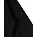 Close-up of black softshell jacket sleeve showing zippered chest pocket and smooth stretch fabric detail