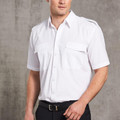 Man wearing white short sleeve shirt with epaulette shoulders and twin chest pockets with button flaps