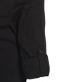 Black ladies chef jacket detail showing chest pocket, rolled cuff and dark button fastening