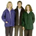 Three kids wearing fleece-lined waterproof jackets in purple, black, and bottle green with multiple pockets and zip front