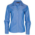 Chambray blue ladies long sleeve button-up shirt with spread collar and fitted silhouette