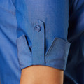 Cornflower blue shirt cuff with grey contrast trim and button placket detail