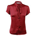 Crimson red satin-finish cap sleeve blouse with tie neck detail and button front placket